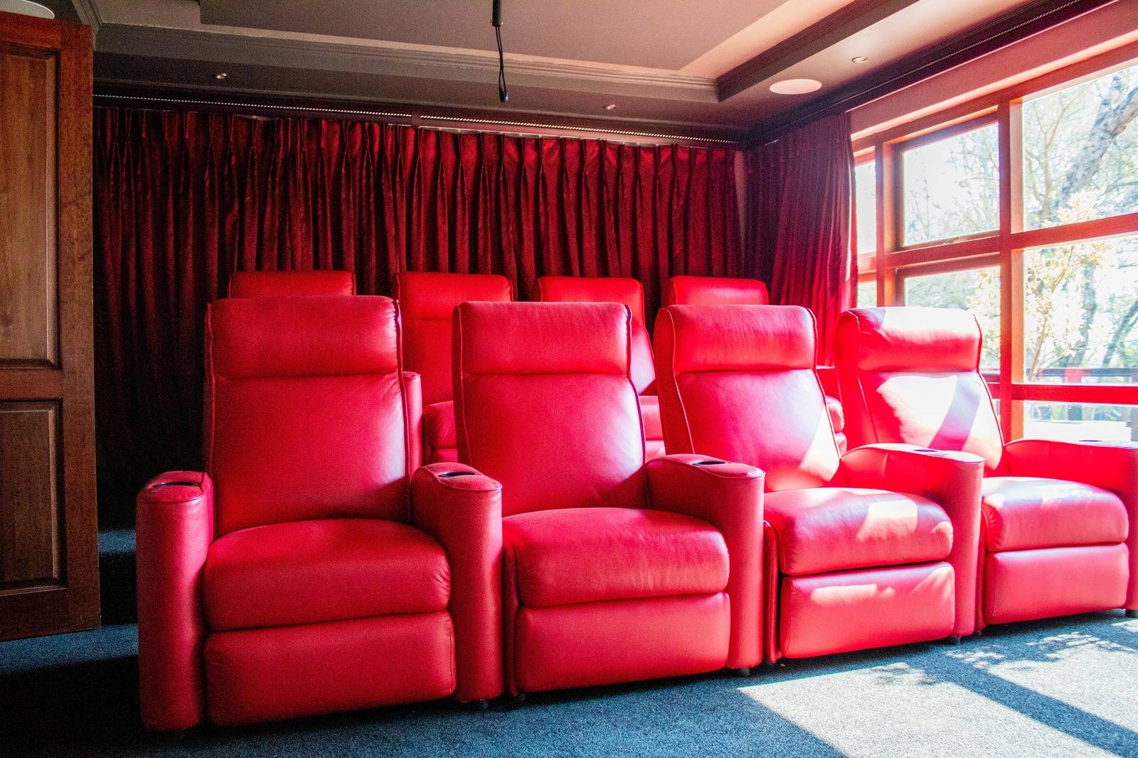 home cinema seating and velvet curtains